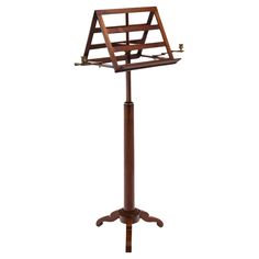 a wooden music stand sitting on top of a white background