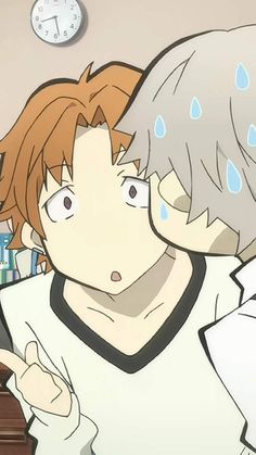 two anime characters are hugging in front of a clock