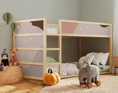 a child's bedroom with two bunk beds and toys on the floor in front of them