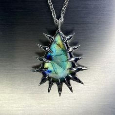 One-of-a-kind handmade labradorite  pendant. comes with 24 inch stainless steel chain material: 99.3% tin, 0.7% copper, Labradorite coated in protectaclear to protect and prevent tarnishing. protectaclear isn't permanent and may flake off gemstones over time To care for your piece, avoid contact with water, high temperatures, and pressure. In other words treat it like a lil piece of wearable art 🤎 since soft solder jewelry is fragile, should your piece break for any reason I offer a one time free repair. message for details.  @newlin online. newlinsbeenjewelin Soft Solder Jewelry, Solder Jewelry, Soft Solder, Soldering Jewelry, Labradorite Pendant, Steel Chain, Stainless Steel Chain, Wearable Art, Labradorite