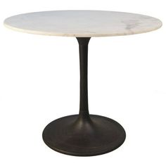 a white marble table with an iron base and black metal base, on a white background