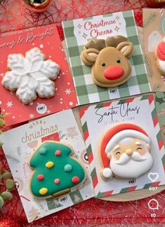 decorated christmas cookies and greeting cards on a table