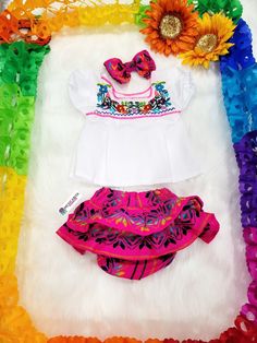 Ready to party??? Let's taco-bout it These Mexican Outfit set for baby girls are adorable. Completely handmade Embroidered Blouse ***Set includes*** Blouse Bloommer has ruffles on the back. Bow Embroidery colors will vary. Ready to ship in 1 day. We at Mexicanita Handmade truly appreciate your business, and we’re so grateful for the trust you’ve placed in us. We sincerely hope you are satisfied with your purchase if not please do not hesitate to reach out to us by e-mail mexicanitahandmade [!at] Summer Multicolor Embroidered Sets, Multicolor Bohemian Sets With Ruffles, Bohemian Multicolor Sets With Ruffles, Bohemian Multicolor Ruffled Sets, Outfit Fiesta, Mexican Rebozo, Bow Embroidery, Fiesta Outfit, Mexican Outfit