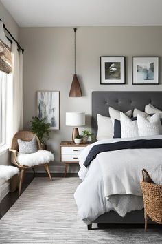 a bedroom with gray walls and white bedding