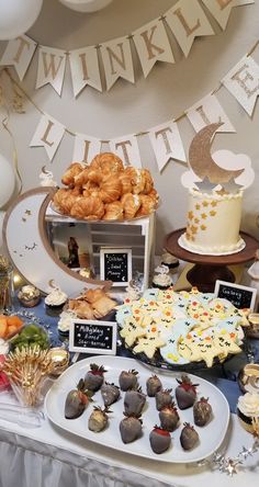 an assortment of desserts and pastries on a table