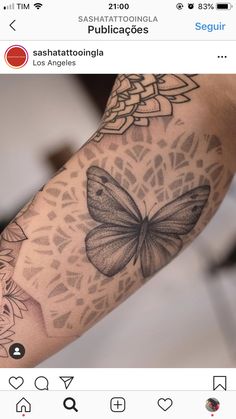 a woman's arm with a butterfly tattoo on it