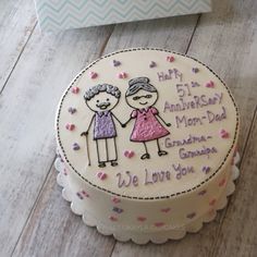 a birthday cake with an image of two people on it