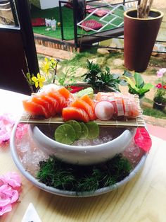 sushi platter with fresh sashimi on it