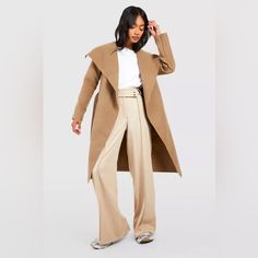 Boohoo Nwt Belted Waterfall Coat. Love The Style, But I Need A Bigger Size! Size: S/M Condition: Nwt Color: Camel My Info: 5’2” 35-28-41 From Boohoo: Add Some Sophistication To Your Closet With This Stunning Waterfall Jacket. The Cut Of This Waterfall Coat Provides A Soft, Relaxed, And Slimming Fit As It Can Be A Casual Choice Or Dressed Up For A More Elegant Look. Add Jeans, A Tank Top, And Sneakers For Casual Days Hanging With Friends, Or Pair Your Waterfall Jacket With A Blouse And Booties Fo Long Camel Coat For Spring, Fitted Camel Outerwear For Spring, Camel Long Coat For Spring, Chic Fitted Camel Outerwear, Spring Camel Long Coat, Cowl Sleeve, Fitted Long-sleeve Faux Wrap Outerwear, Waterfall Coat, Waterfall Jacket