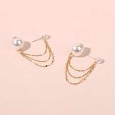 Add the elegance of 18k gold-plated and the warmth of pearl to your day or evening look with these simple, sophisticated drop earrings. 0.59" W x 1.57" L 18k gold-plated copper / pearl Evening Look, Copper Pearl, Ear Jacket, Gold Plated Chains, Pearl Necklace, 18k Gold, Gold Tones, Pearl Earrings, Gold Plate