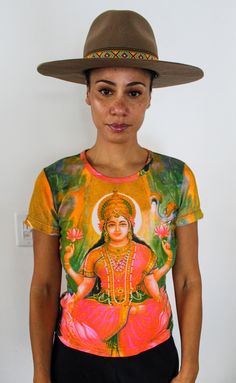 Lakshmi Hindu Goddess T-Shirt. Beautiful print shirt honoring the Hindu Goddess Lakshmi of the Hindu God Pantheon. Hindu Goddess, The Hindu, Goddess Lakshmi, Hindu God, Print Shirt, Dress Clothes For Women, Printed Shirts, Dress Outfits, Womens Dresses