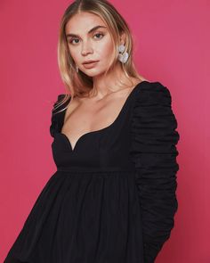 This elegant blouse is a true showstopper. Done with a structured bodice and ruched sleeves to compliment the relaxed body. Back zipper Sweetheart neckline Structured fabric Content: 100% Polyester Halloween Crop Top, Halloween Skirt, Elegant Blouses, Crop Top Blouse, Cardigan Tops, Puff Sleeve Top, Halloween Dress, Cutout Dress, Dress Suits