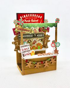 a miniature gingerbread stand on a white background