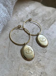 Handmade boho earrings brass creoles diameter 2 cm Adjustable Gold Evil Eye Earrings, Gold Evil Eye Drop Earrings, Adjustable Gold-plated Nickel-free Hoop Earrings, Bohemian Hammered Hoop Jewelry, Gold Round Evil Eye Earrings, Bohemian Gold Plated Yellow Gold Hoop Earrings, Bohemian Yellow Gold Plated Hoop Earrings, Handmade Small Hoop Brass Earrings, Small Hammered Hoop Earrings Bohemian Style