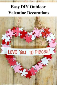 valentine's day decoration made out of puzzle pieces with the words easy diy outdoor valentine decorations