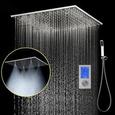 the shower head is open with water coming from it and an image of a rain shower head