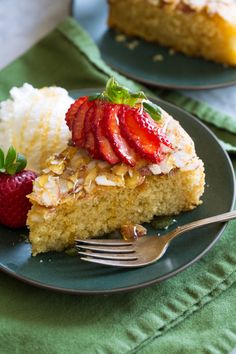 a slice of cake with strawberries on top