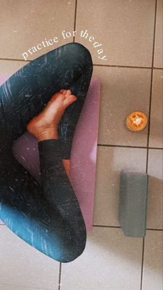 a woman is sitting on a yoga mat with her legs crossed and the words practice for the day above her