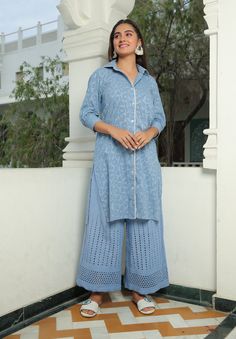 Upgrade your summer wardrobe with this premium quality Handmade Airy Blue Dress Set 2 piece set. Handmade with sustainable materials, this blue kurta features a unique print, long sleeves and pairs perfectly with the flared pants. Perfect for casual outings, this set is a versatile addition to your wardrobe. Made from cotton, it is comfortable to wear and will keep you stylish all season long. Ideal for gift giving, surprise your loved ones with this stylish and sustainable outfit. Details: Colo Summer Straight Kurta With Set-in Sleeves, Blue Straight Kurta Sets For Summer, Blue Long Sleeve Pant Set For Spring, Blue Chikankari Embroidery Sharara For Spring, Blue Chikankari Embroidered Sharara For Spring, Blue Sharara With Chikankari Embroidery For Spring, Spring Blue Sharara With Chikankari Embroidery, Eid Pant Set With Long Set-in Sleeves, Traditional Indigo Sets For Summer