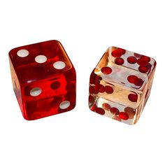 two red and white dices sitting side by side