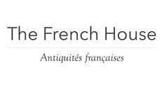 the french house logo with black and white lettering on it's side, in front of