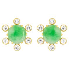 A fascinating pair of earrings giving centre stage to two superb 2.50 carat each cabochon Jades. Surrounding each earring are six old cut diamonds, evenly spaced out between the claws holding the jade in. The diamonds have been rub over set and have a combined weight of 1.80 carat. These gorgeous earring have been crafted in 18ct yellow gold and finished off with comfortable and secure posts with clip on backs. Gemstone: Jade Stone Shape: Cabochon Carat Weight: x2 2.50 Age: 1900s Metal: 18ct Yel The Claw, Jade Stone, Gorgeous Earrings, Diamond Earrings, Diamond Cuts, Jade, Jewelry Earrings, Yellow Gold, Gemstones