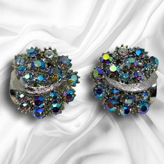 Vtg 1960s ART Aurora Borealis Crystal Silver Tone Earrings Signed Couture Runway Part of large buyout of former Manhattan jewelry store that was shuttered in the 1980's. Item is in good overall pre-owned condition; no flaws noted; please see photos for complete condition assessment. Vintage Multicolor Evening Earrings, Vintage Multicolor Earrings For Evening, Multicolor Vintage Evening Earrings, Vintage Multicolor Clip-on Jewelry, Multicolor Vintage Earrings For Evening, Antique Clip-on Earrings For Party, Retro Clip-on Earrings For Party, Retro Jewelry For Pierced Ears For Parties, Mid-century Clip-on Earrings For Party