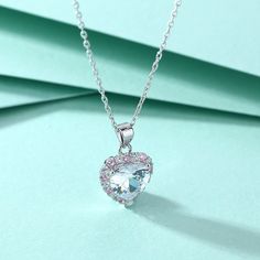 Indulge in the beauty and elegance of the 2.0 Ct Heart Shaped Moissanite Necklace from Evani Naomi Jewelry. Made from 92.5% pure silver + 7.5% hypoallergenic metals, this necklace is dipped 5x in 18k white gold for added shine and durability. The heart cut moissanite stone is equally beautiful and shining at about 1% of the cost of a mined diamond. Ethically sourced and finely handcrafted, this necklace is the perfect combination of high quality and affordability. MATERIALSMetal Type: Silver 925 Diamond Carat Size, Pink Zircon, Silver Necklace For Women, Moissanite Necklace, Cvd Diamond, Silver Heart Necklace, Solid Gold Jewelry, Skull Ring, Pendant Silver