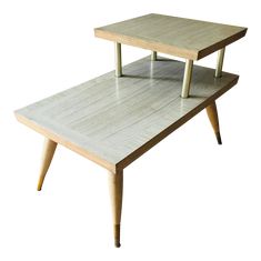 a wooden table with two shelves on each side