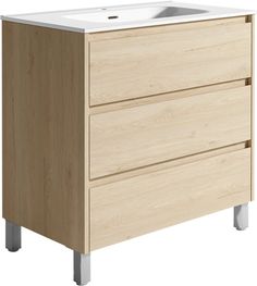 a white sink sitting on top of a wooden cabinet next to a metal leg rest