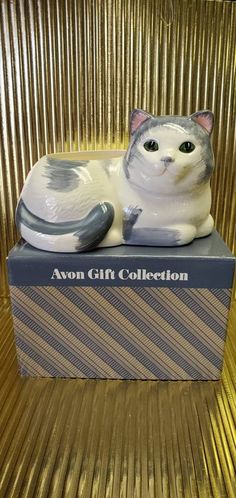 Vintage Avon Gift Collection Ceramic Cat Planter New In Box This has been stored in a CLEAN, smoke free, pet free, temperature controlled environment since it was purchased! Cat Planter, Cat Basket, Avon Collectibles, Traverse City Mi, Ceramic Cat, Face Stickers, Traverse City, Vintage Avon, Gift Collections