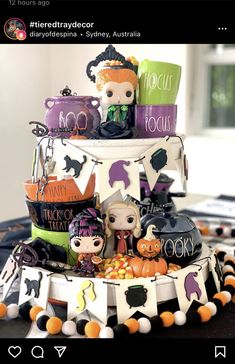 there is a cake with halloween decorations on it