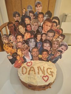 a cake that has been decorated with pictures of people and the word love on it