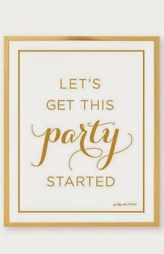 a white and gold party sign with the words let's get this party started