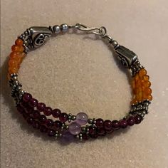 Handmade Triple Strand Bracelet With Garnet And Carnelian Semiprecious Stones With Sterling Silver Accents 3 Strand Bracelet, John Hardy Bracelet, Knot Bangle, Slide Bracelet, Gold Bracelet Set, Gold Skull, Turquoise Crystal, Gold Ring Sets, Glass Bracelet