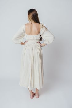 The Juliet Midi Dress is an elegant, ultra-flattering gown that's perfect for any occasion. We just love a 3/4 length sleeve, and the Juliet delivers with a loose, elastic-cuffed sleeves, plus a square neckline and smocked bodice for maximum comfort. Pair with slides for a more relaxed look, or dress it up with neutral heels! FIT: Runs true to size. MATERIAL: GARMENT DETAILS: A-line midi dress with square neckline and 3/4 length sleeves with elasticized cuffs. Features a smocked bodice, accent r Dress With Square Neckline, Neutral Heels, Garment Details, Ribbon Tie, Square Necklines, Cuff Sleeves, Square Neckline, Love A, Just Love