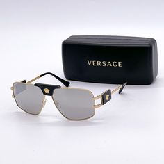 100% New Authentic Eyewear With Full Package Brand: Versace Model: Ve2251 1002/6g 63-12-145 Condition: New With Full Package Color: 1002/6g Frame Material: Metal Frame Color: Gold, Black Lens Color: Silver Size: 53-12-145 Made In Italy Item Includes: - Authentic Eyewear - Certificate Of Authentic - Authentic Case, Box - Cleaning Cloth We Guarantee That All Our Items Are 100% Authentic And Brand New. Classic Silver Sunglasses For Parties, Luxury Silver Sunglasses With Square Frame, Designer Silver Sunglasses For Party, Luxury Silver Square Frame Sunglasses, Designer Silver Party Sunglasses, Designer Silver Sunglasses With Tinted Lenses, Luxury Silver Sunglasses With Uva Protection, Designer Silver Tinted Sunglasses, Designer Silver Sunglasses For Formal Occasions