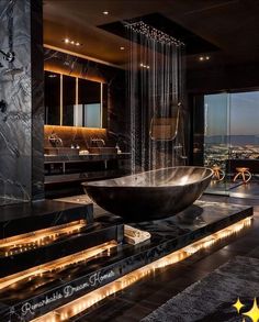 a large bath tub sitting in the middle of a bathroom