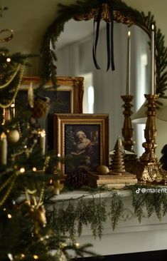 a christmas tree is sitting in front of a mirror