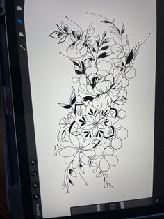 a black and white drawing of flowers on a computer screen