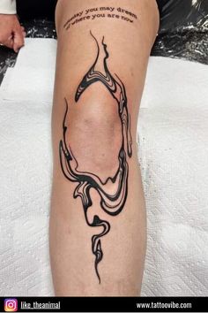 a woman's leg with a tattoo that reads, you may dream where you are now