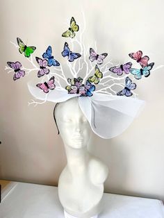 "Butterfly Fascinator- Horse Racing style- Kentucky Derby- Derby Day- Wedding- Ladies Luncheon  Hello,            This fascinator is made with  butterflies that are 3\"wide. They are perched on branches that are plastic that are painted and will not break as natural ones would. Its all placed on a horse hair net that's a  14\" circle. It's called horse hair because years ago it was made with horse hair and the name stuck. It is attached to a satin covered skinny headband and is adjustable. It's White Whimsical Headband Fascinator, Whimsical White Fascinator For Royal Ascot, Whimsical White Fascinator For Kentucky Derby, Kentucky Derby Hats Diy Funny, Kentucky Derby Hats Diy, Derby Hats Diy, Butterfly Art And Craft, Butterfly Fascinator, Derby Headband