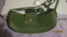 This auction is for a "beautiful"                                                                                                                                                                                                                                                                                                               DEBORAH LEWIS WOMENS LEATHER GREEN FLORAL COLOR SHOULDER BAG NEW WITH TAGS. A must for any true fan or investor!! THIS ITEM would be an EXCELLENT addition to your c