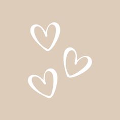 three hearts drawn in white on a beige background with the word love written below it