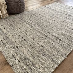 an area rug on the floor in a living room