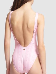 Open back. All over print placement may vary. Model is wearing a size1 Pink Fitted Swimwear With Low Back, Fitted Pink Swimwear With Low Back, Fitted Low Back Pink Swimwear, Versace Sneakers, Pink Swimsuit, All Over Print, One Piece Swimsuit, Open Back, Versace