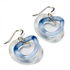 pair of blue and white earrings with silver earwires against a white background photo