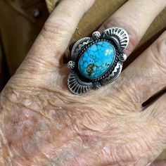 Size 7.5    Nice and heavy made ring  High Grade Kingman Turquoise   Signed by the Maker, Gilbert Tom    Exported By ExportYourStore :) SKU:2898774182* Handmade Heirloom Turquoise Ring, Untreated Blue Turquoise Western Ring, Artisan Turquoise Ring Round Collectible, Western Style Untreated Oval Turquoise Ring, Handmade Western Turquoise Ring In Sterling Silver, Artisan Round Turquoise Ring Collectible, Artisan Round Turquoise Collectible Ring, Artisan Turquoise Ring With Large Stone, Artisan Turquoise Ring With Large Stone Collectible