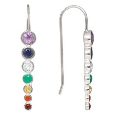 Chakra earrings created with a fusion of beautiful gemstones and sterling silver. Wearing chakra jewelry is believed to provide healing energies to the body, mind and spirit and lead to a more contented, energized and stress-free life. Earrings have an anti-tarnish coating. Gemstones graduate from 2.5mm to 4.5mm in size and include amethyst, iolite, sky blue topaz, green onyx, citrine, carnelian and garnet. Fusion Sterling Silver Earrings With Ear Wire, Multicolor Sterling Silver Ear Wire Jewelry, Rainbow Sterling Silver Jewelry With Ear Wire, Multicolor Sterling Silver Fusion Earrings, Multicolor Fusion Sterling Silver Earrings, Adjustable Rainbow Sterling Silver Earrings, Rainbow Sterling Silver Earrings, Nickel-free Rainbow Sterling Silver Earrings, Rainbow Sterling Silver Nickel-free Earrings