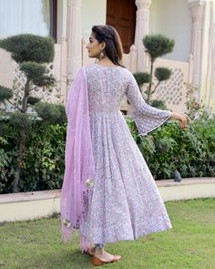 This is a 3-piece set. It comes with soft cotton hand block print anarkali kurta with 32 kali, round neck, 3/4th bell sleeves ankle length.The set also comes with handblock print pants with semi elasticated waistband and kota doria dupatta with gota detailing. Color-Pink & Purple Kurta Fabric-Soft Cotton Bottom Fabric-Cotton Dupatta Fabric-Kota Doria Work-Block Print Neck-Round Neck Sleeves-3/4th Bell Sleeves Washing Care-Dry Clean Only Block Print Anarkali, Printed Anarkali Suits, Anarkali Kurta Set, Mens Wear Wedding, Reception Look, Purple Hands, Anarkali Kurta, Cotton Dupatta, Anarkali Suit